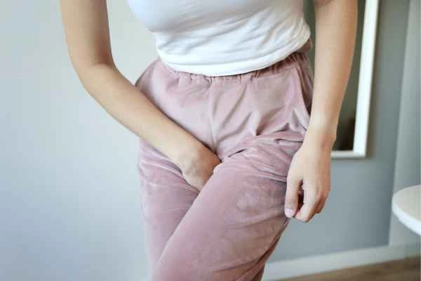 older woman running to the toilet because of urinary incontinence Dunchurch