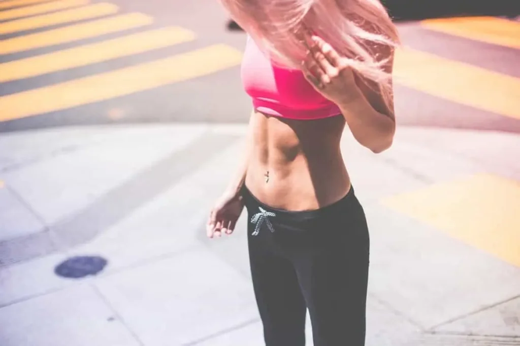 Woman with toned stomach after LA-EMS Body Sculpting Treatment Dunchurch 